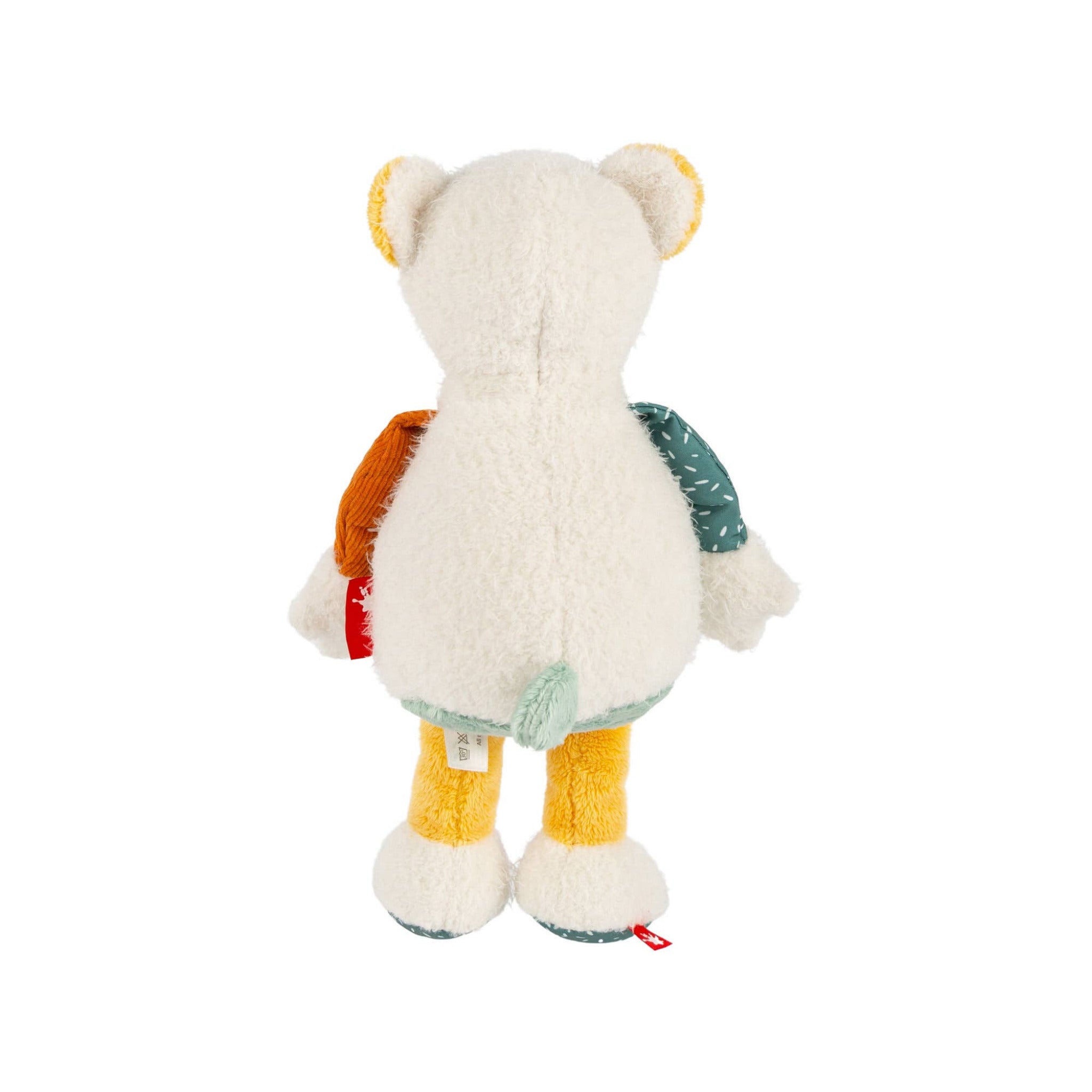 Plush toy bear with colorful backpack and shorts on a white background
