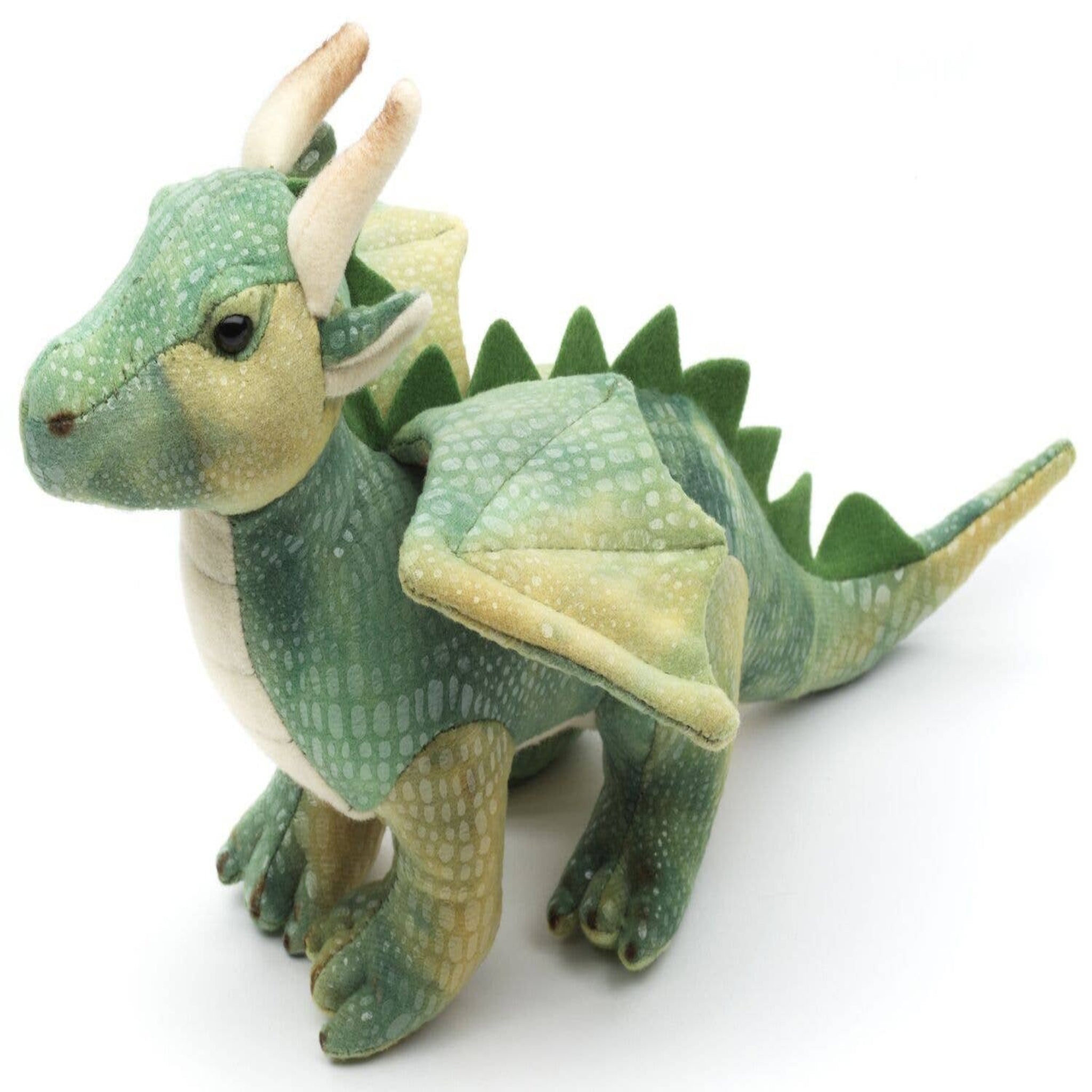 Green plush dragon toy on a white background