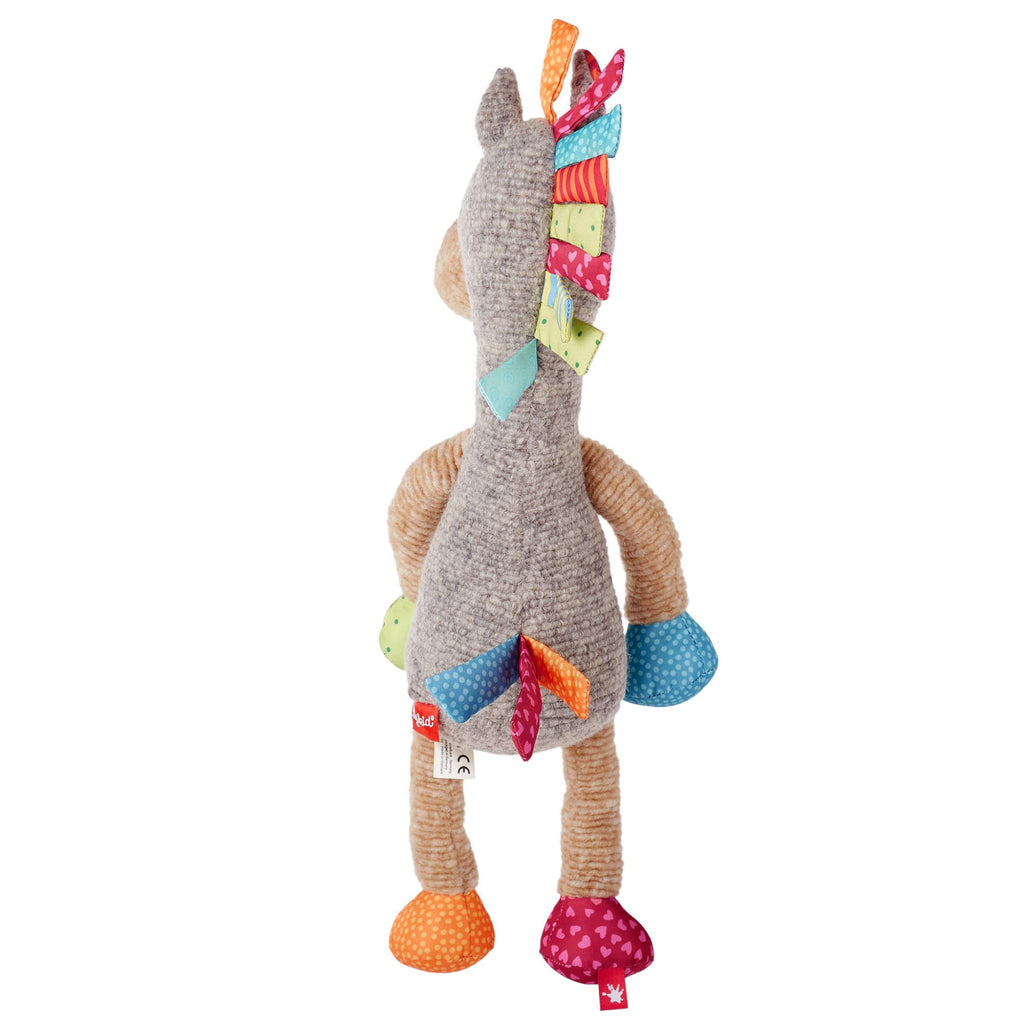 Colorful stuffed animal toy on a white background