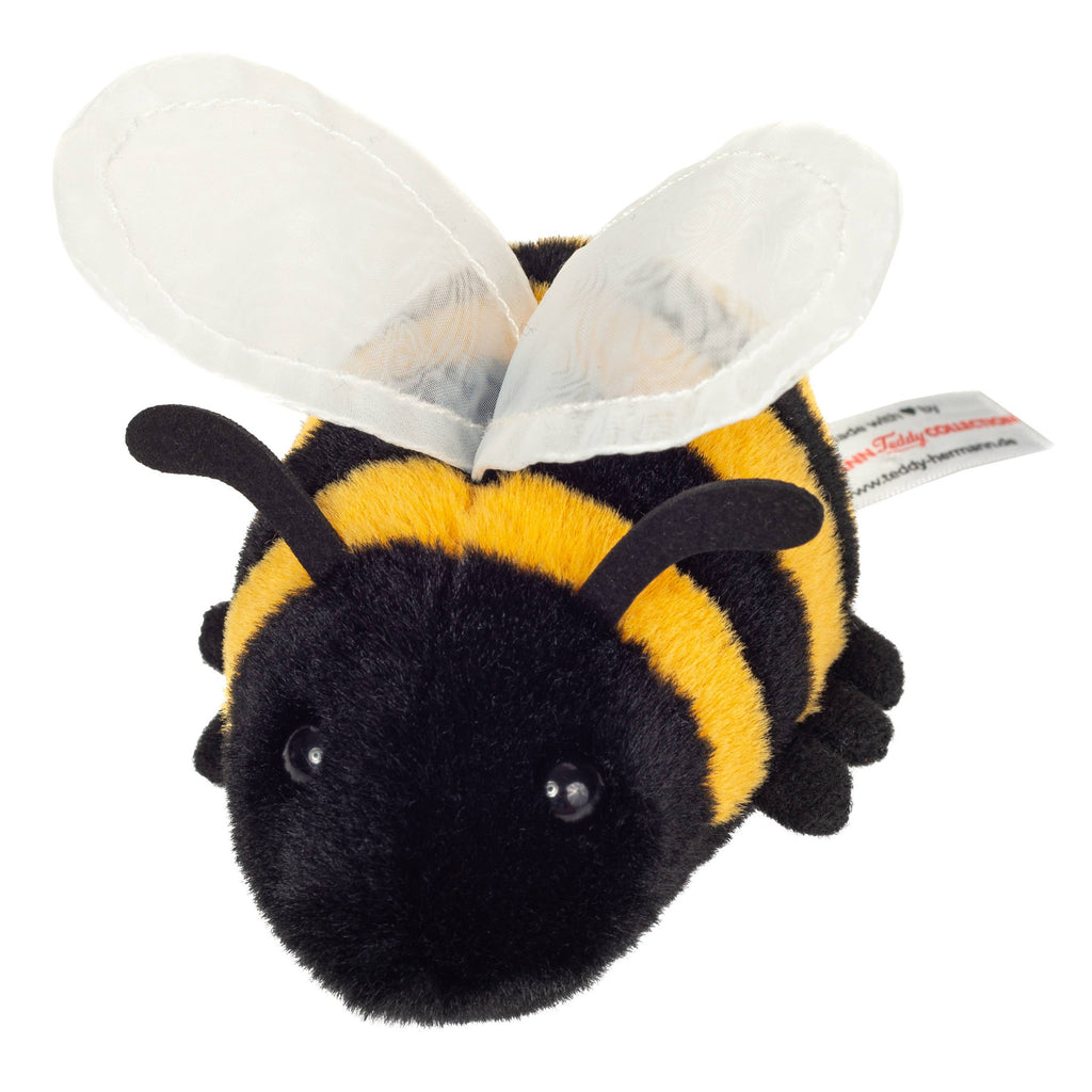Plush bee toy with black and yellow stripes on a white background