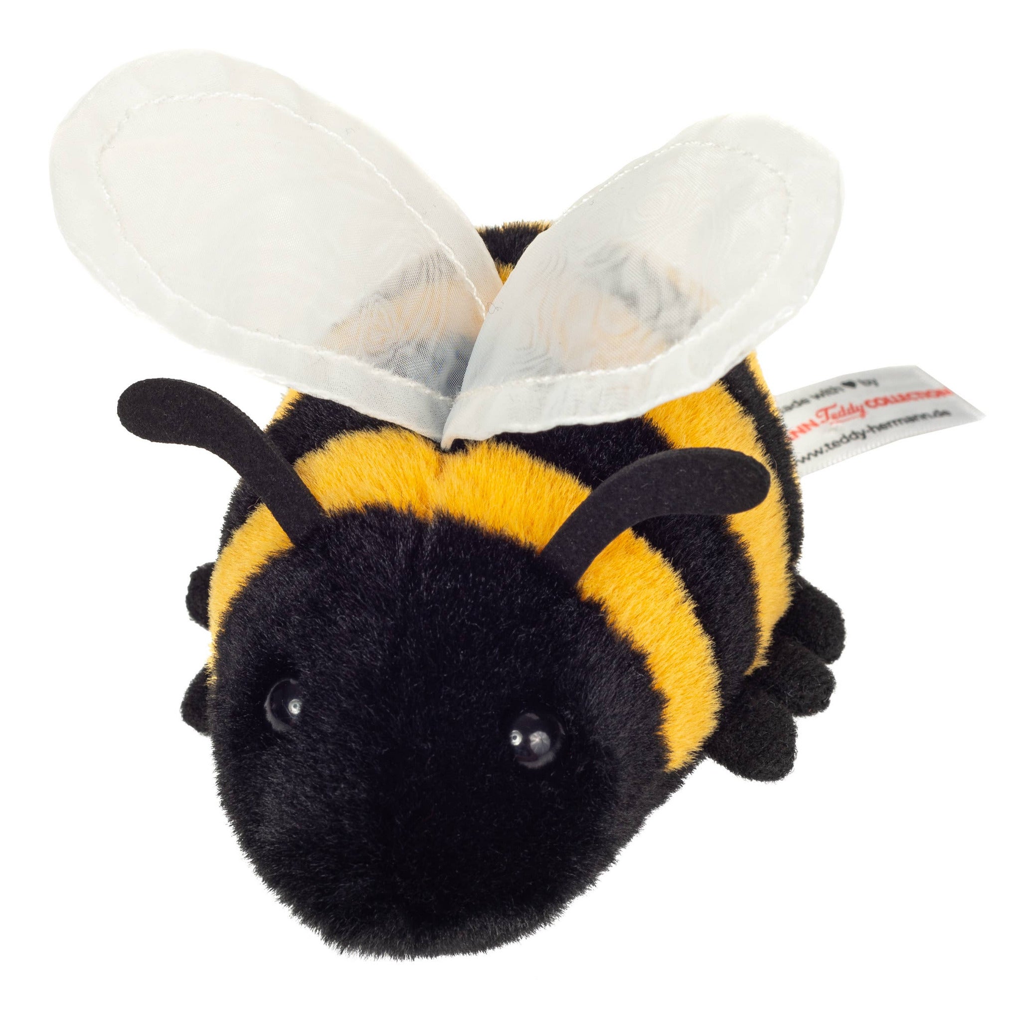 Plush bee toy with black and yellow stripes on a white background