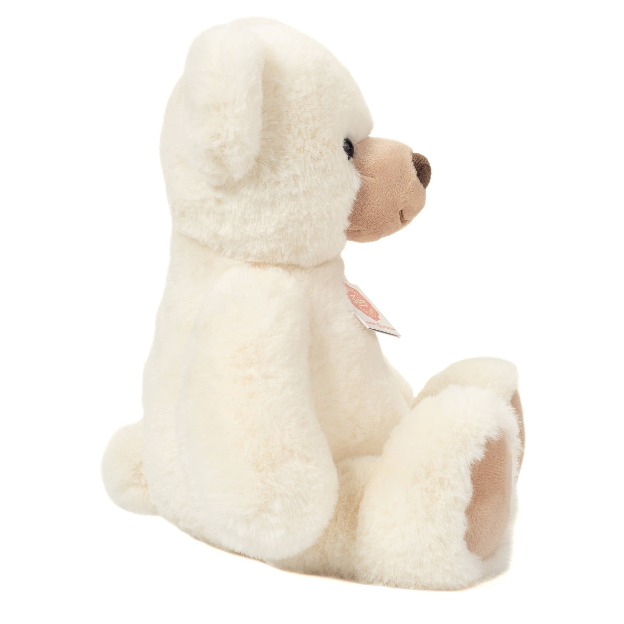 White plush dog toy on a white background