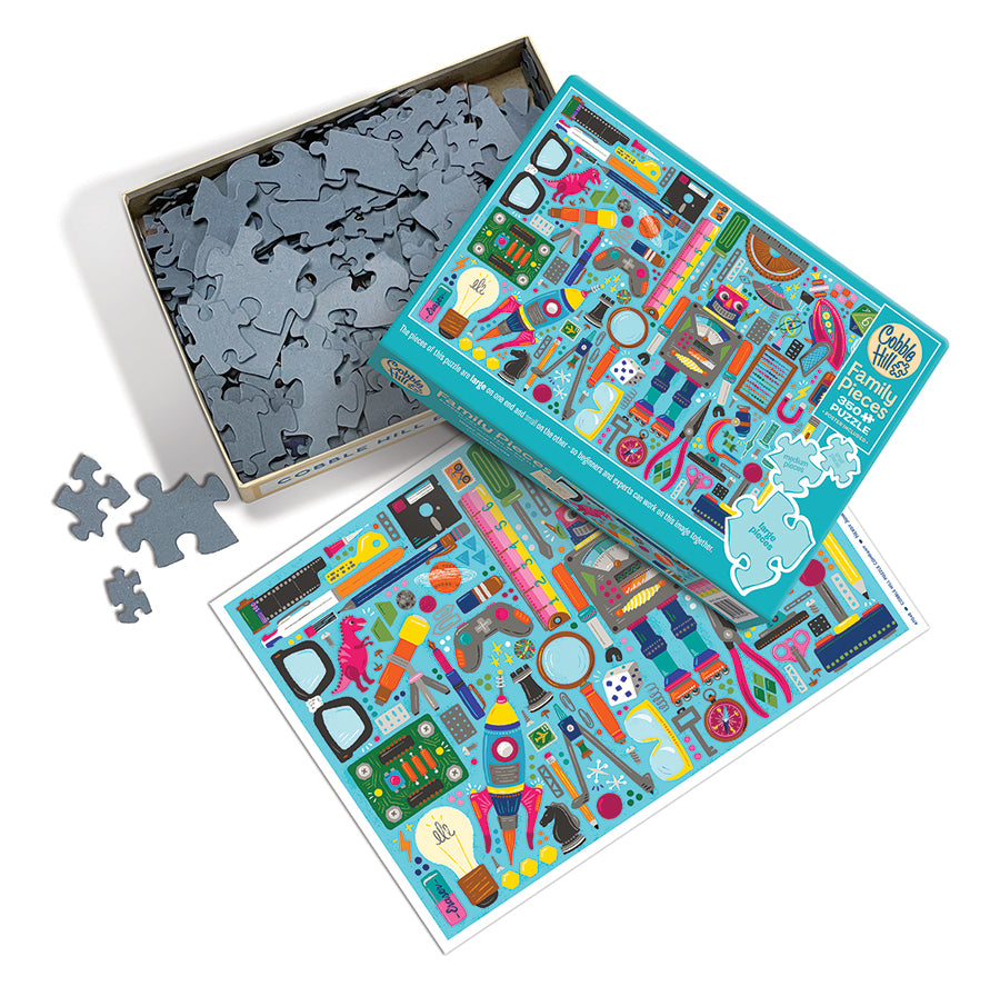 Nerdy Junk Drawer box opened, showing the pieces