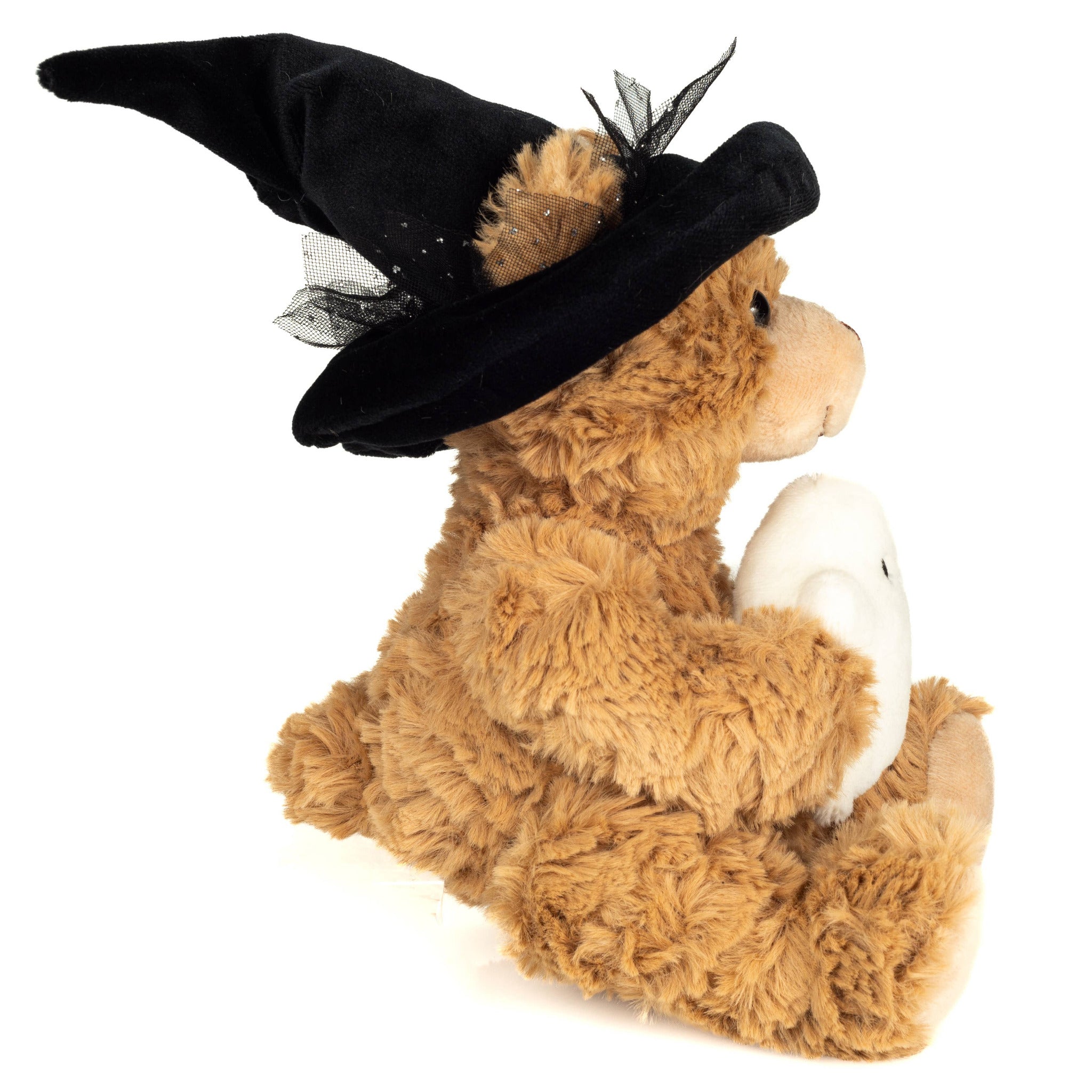 Plush bear wearing a black witch hat with a white rabbit on a white background