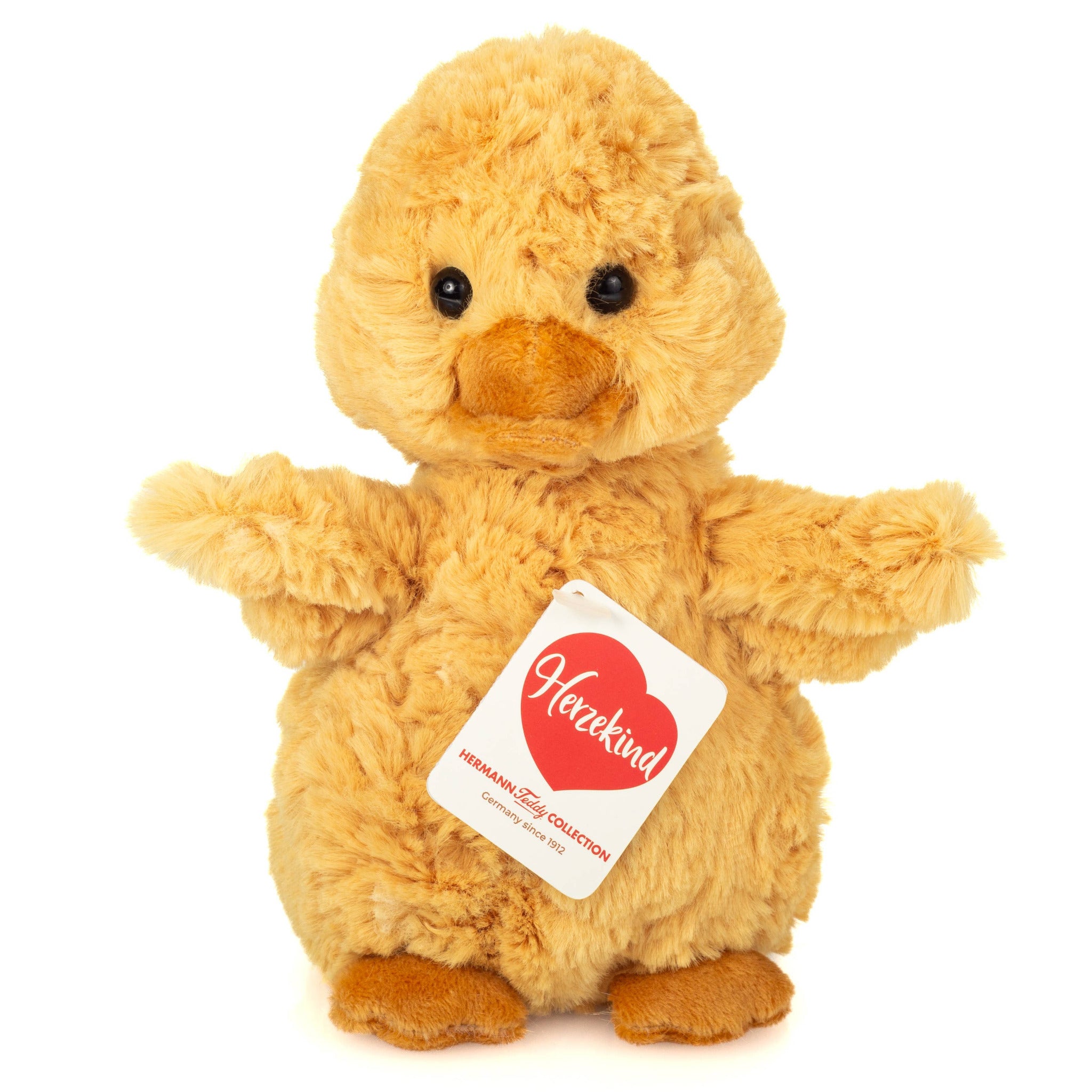 Plush duck toy with a heart-shaped tag on a white background