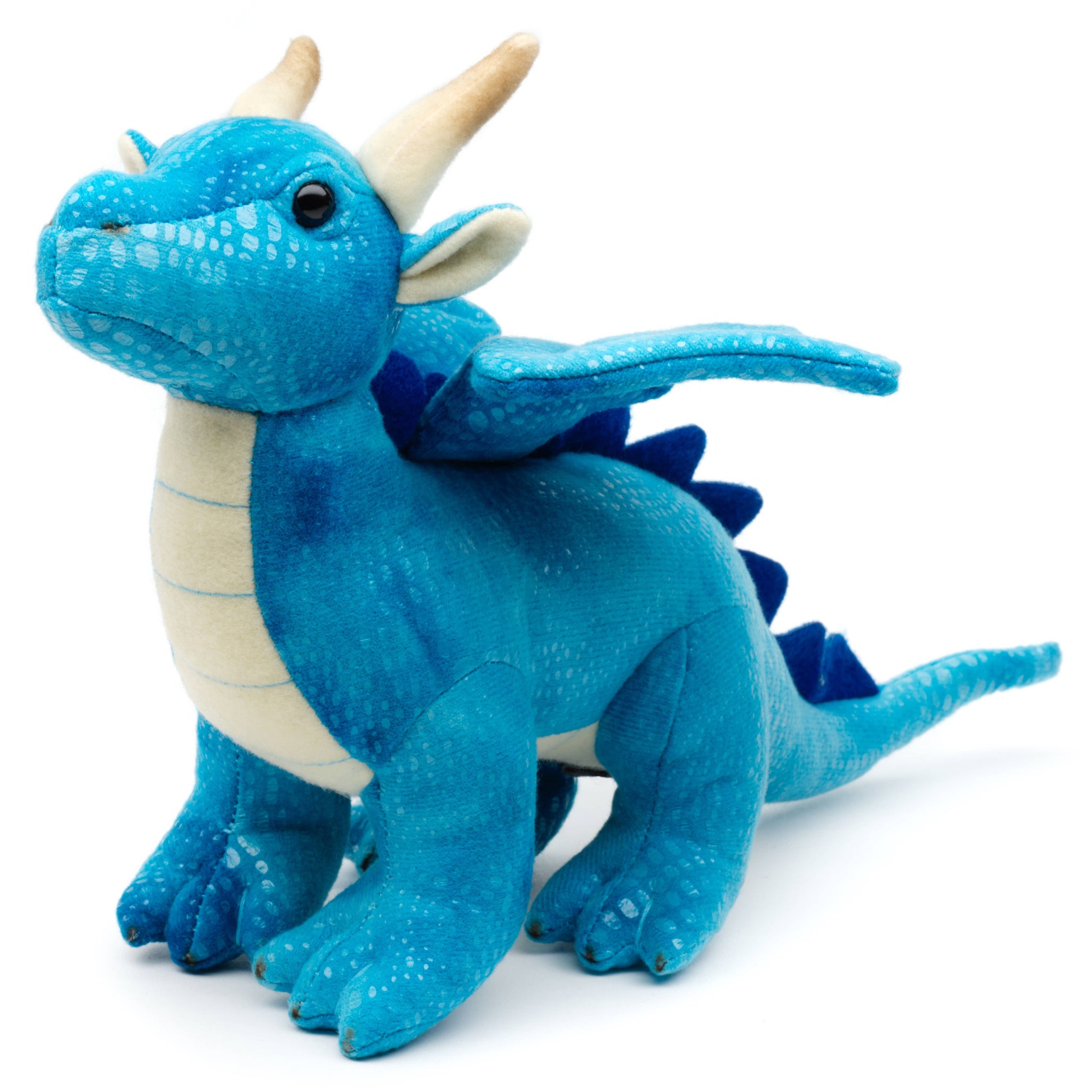 Blue plush dragon toy on a white background
