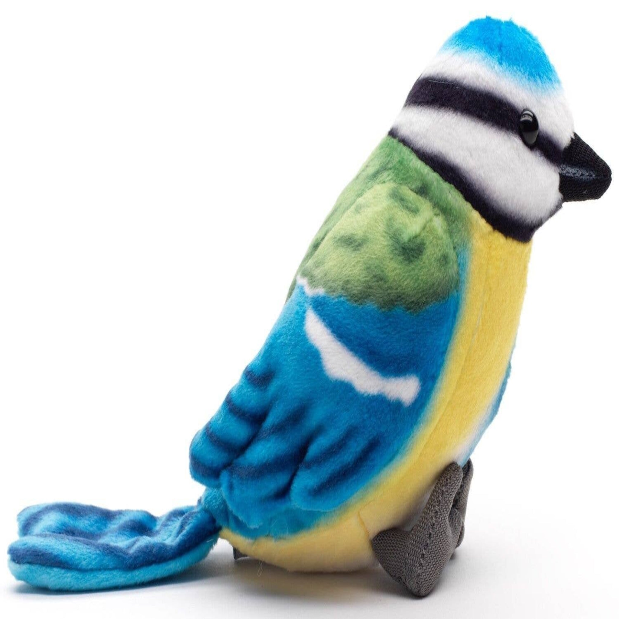 Plush toy bird with blue, green, and yellow colors on a white background