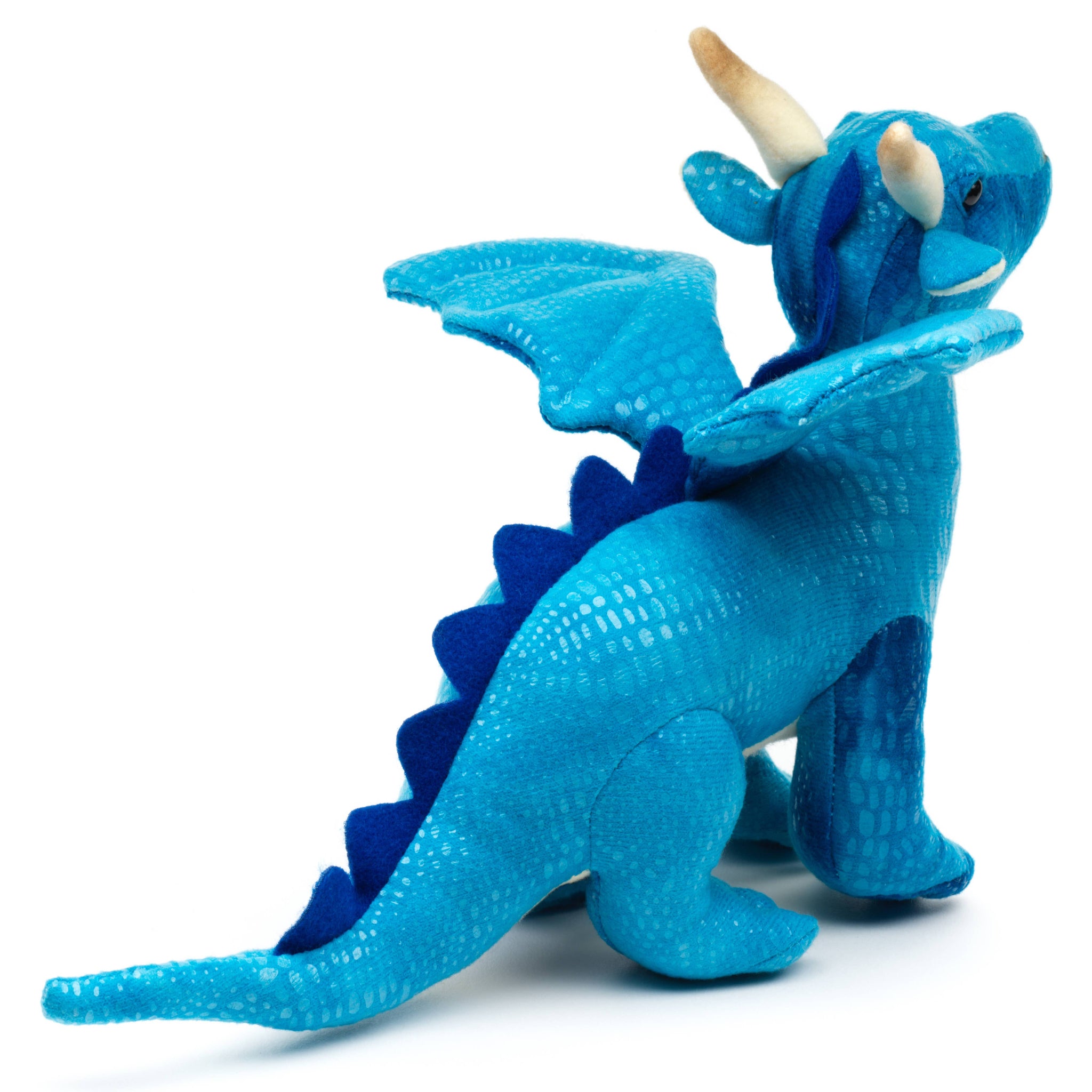 Blue toy dragon with wings on a white background