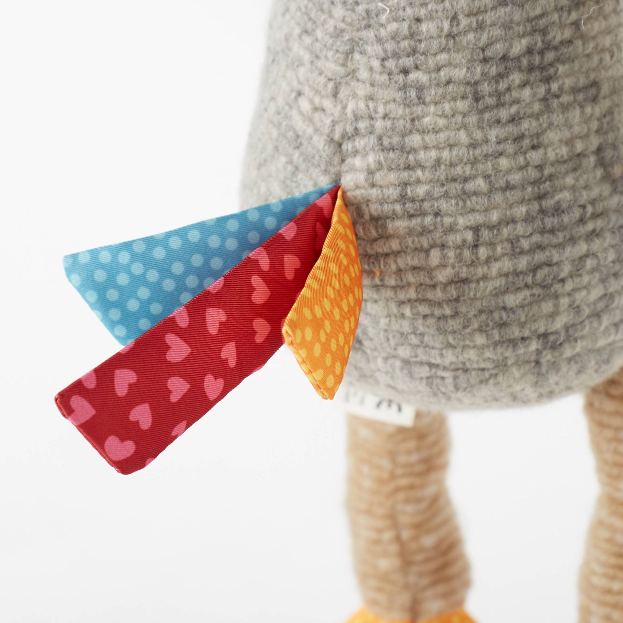 Colorful fabric patches on a textured surface