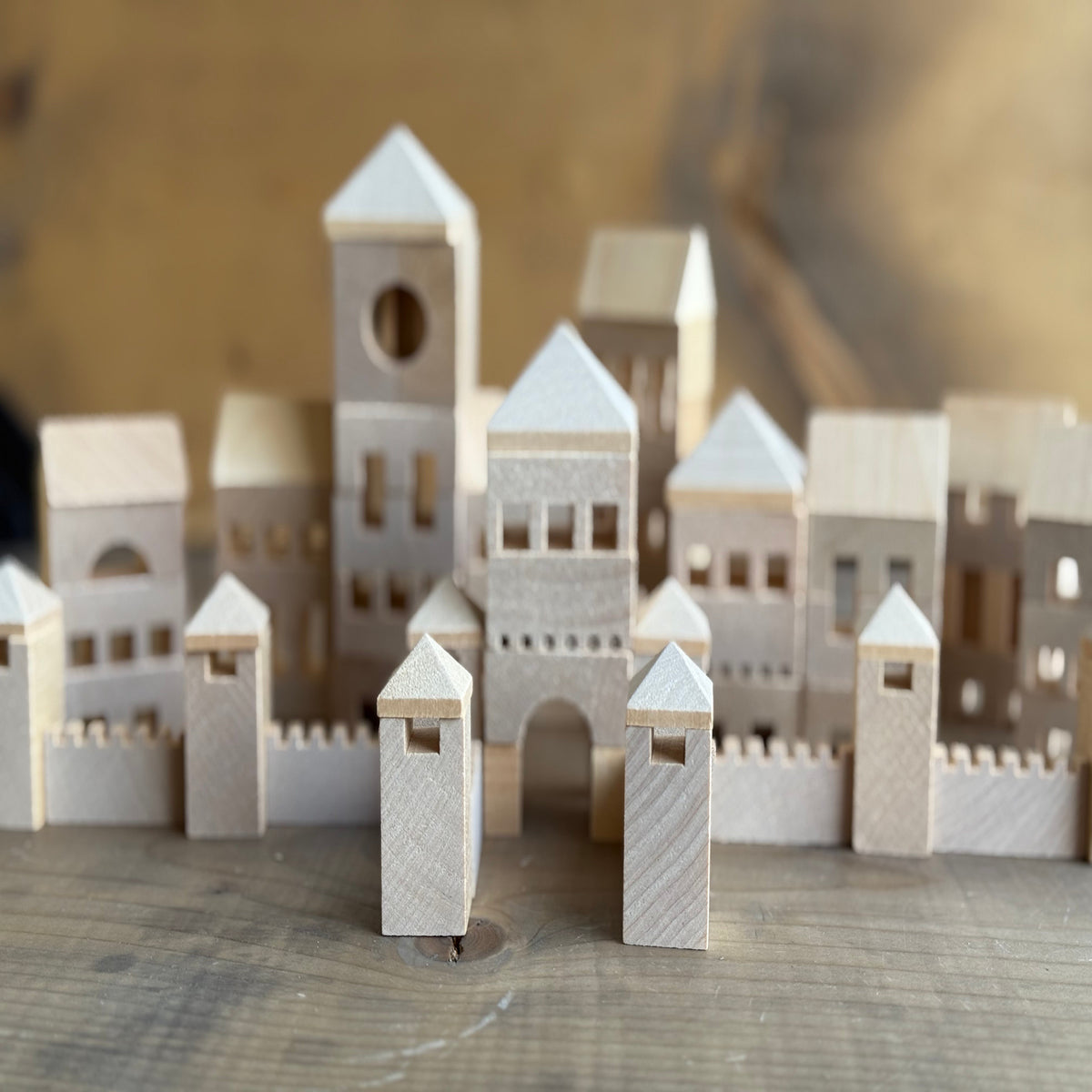 Model of a castle made from wooden blocks.