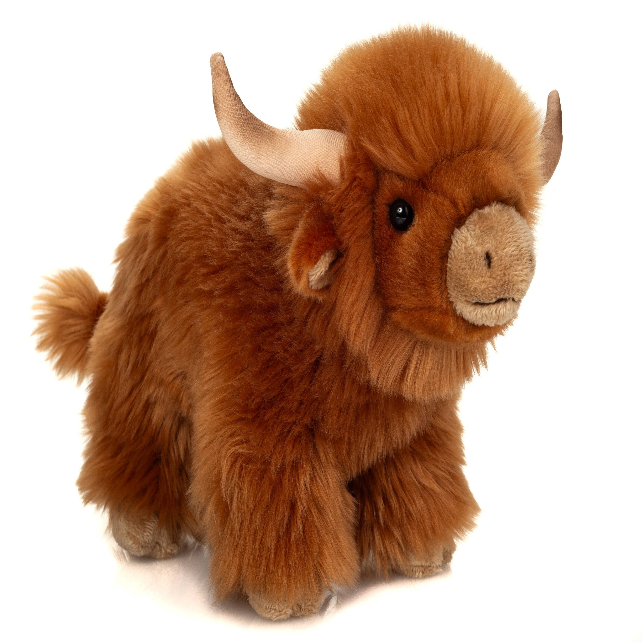 Plush toy of a brown yak on a white background