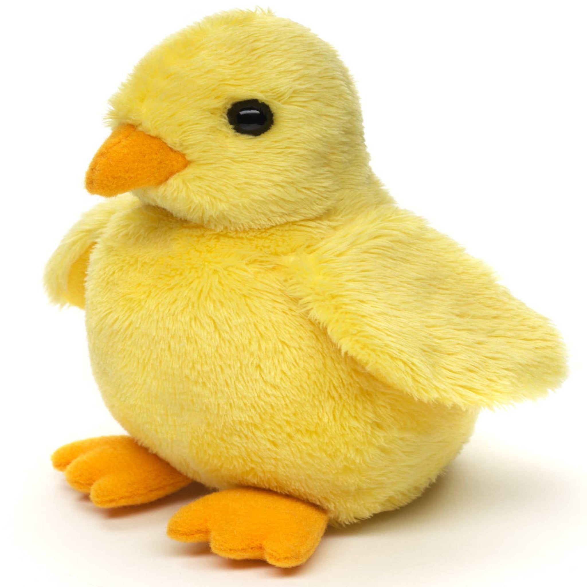 Yellow plush chick toy on a white background