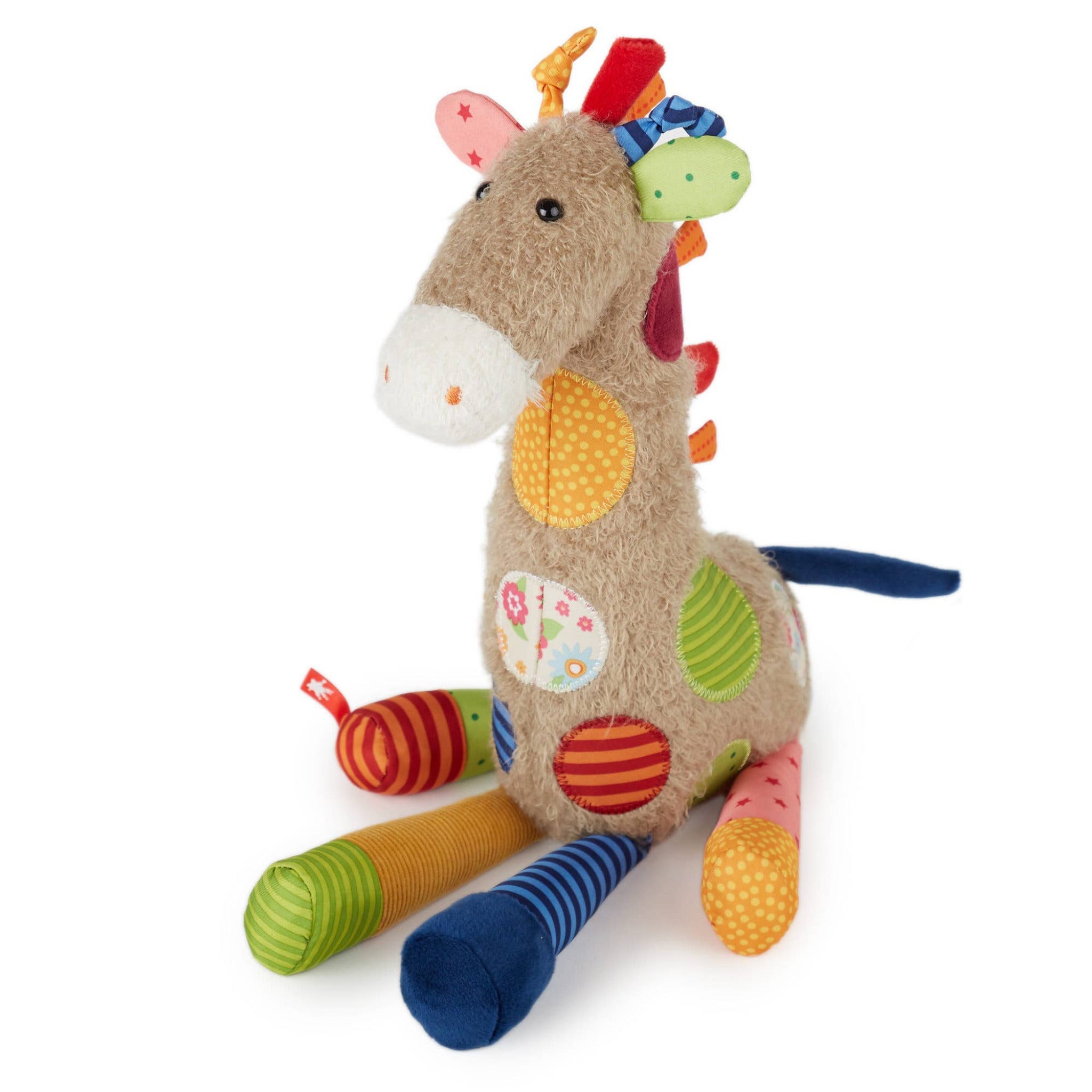 Colorful plush toy dragon on a white background