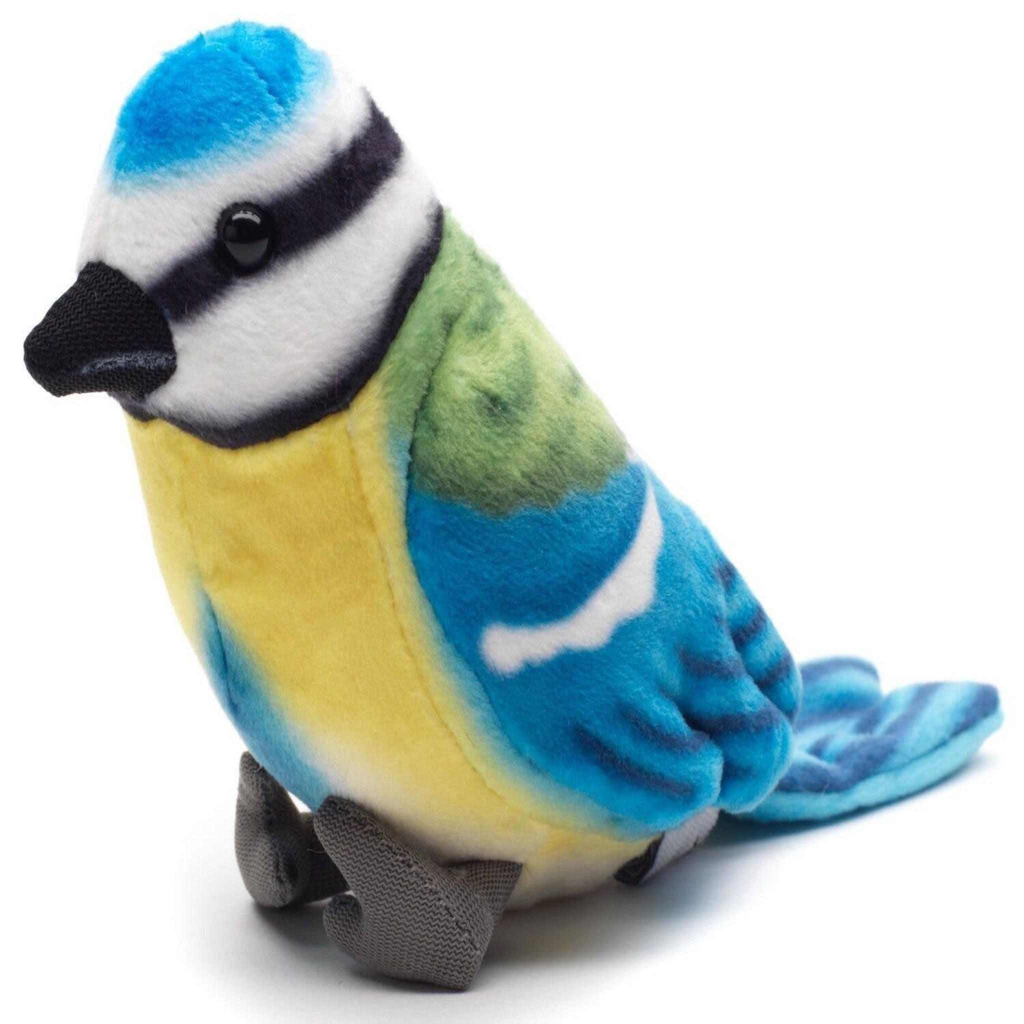 Plush toy resembling a blue and green bird on a white background